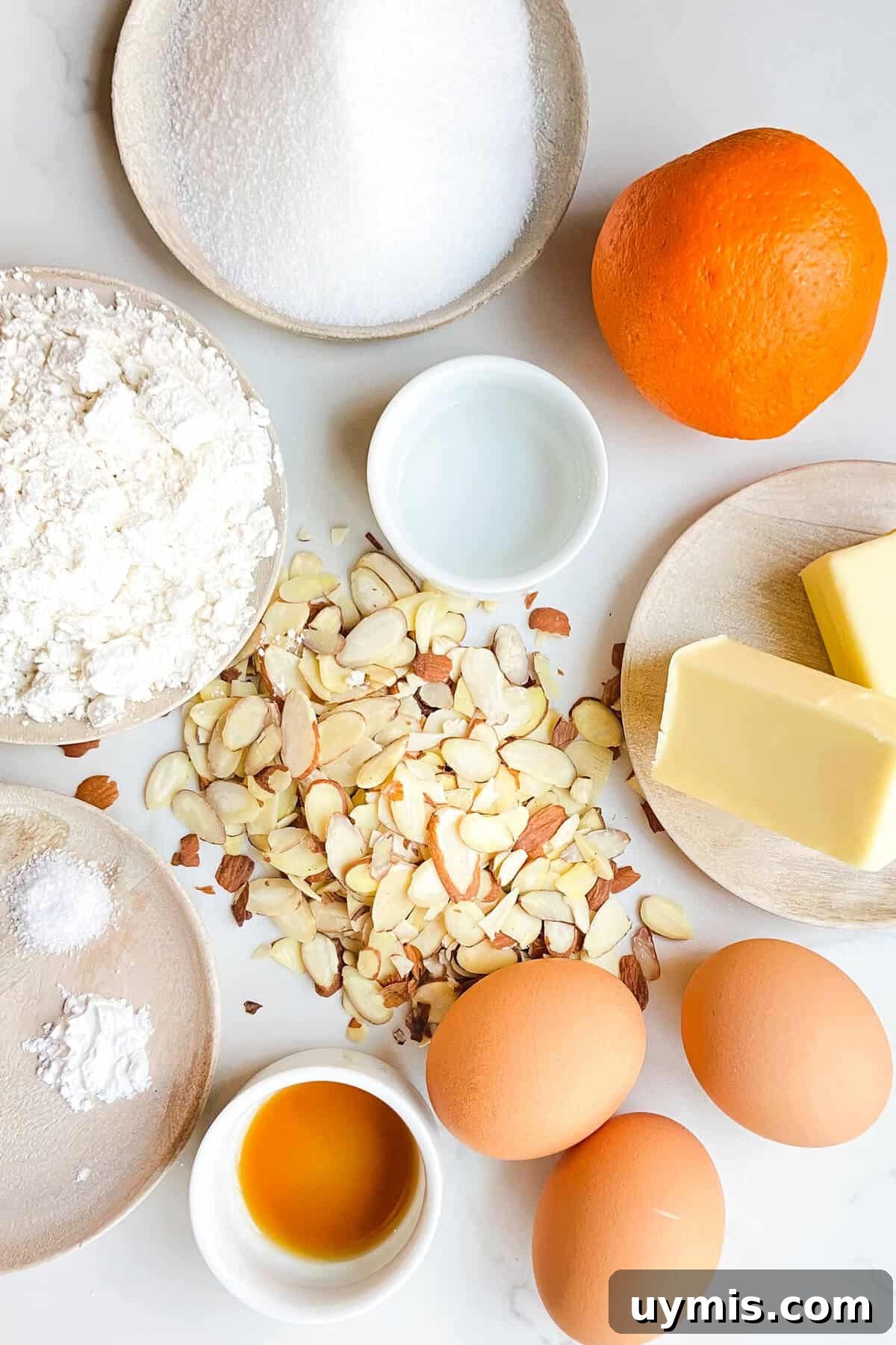 Italian Almond Cake Recipe with Tender Crumb 4 9 ingredients on countertop.