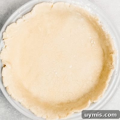 unbaked pie crust in a pie plate