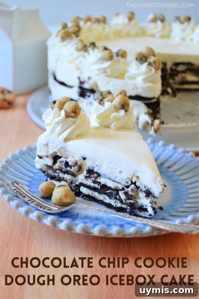 a slice of cookie dough oreo icebox cake on a blue and white ruffle plate with a fork