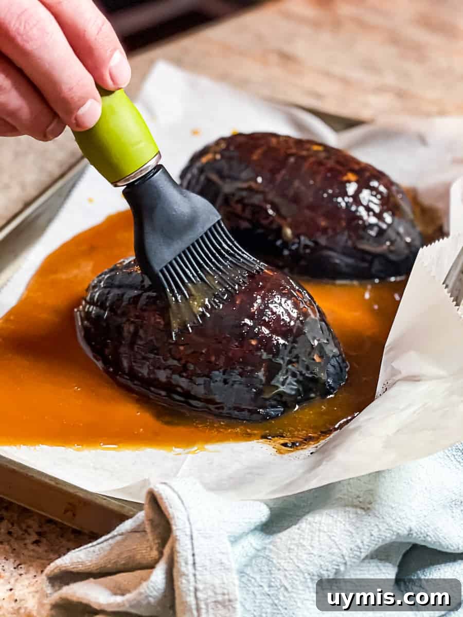 Honey-Glazed Ham Nuggets Recipe with Small Boneless Ham 7 Brushing glaze on ham nugget