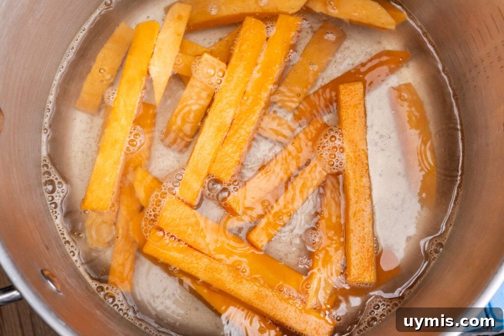 Crispy Air Fryer Sweet Potato Fries 23 Boiling sweet potato fries in a large pot