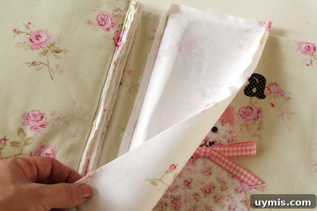 Quiet Book Sew Along Part 9 Finishing Your Book 11 Binding fabric folded over the quiet book spine