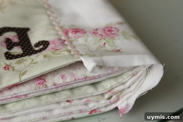 Quiet Book Sew Along Part 9 Finishing Your Book 14 Hand stitching the end of the quiet book binding