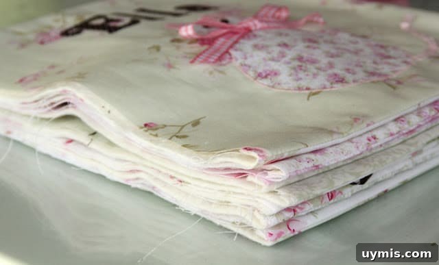 Quiet Book Sew Along Part 9 Finishing Your Book 4 Stacked quiet book pages ready for binding