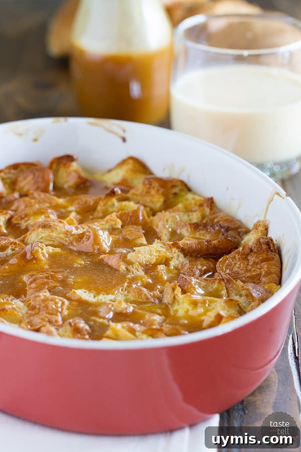 Eggnog Croissant Bread Pudding with Caramel Syrup 3 Warm eggnog croissant bread pudding served with caramel eggnog syrup.