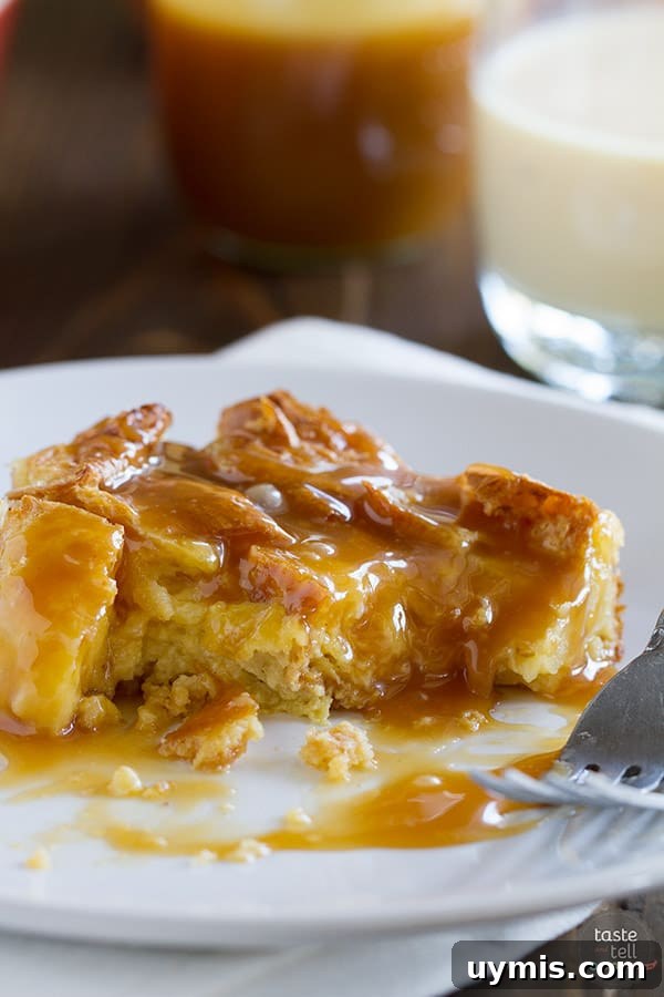 Eggnog Croissant Bread Pudding with Caramel Syrup 5 Eggnog Croissant Bread Pudding with rich caramel eggnog syrup, ideal for holiday brunch or dessert.