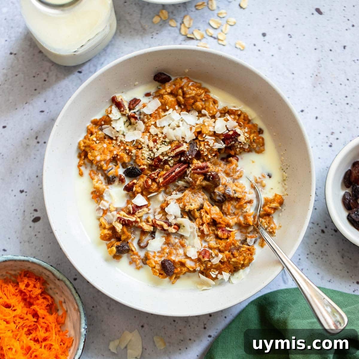 15 Proven Benefits of Carrots and Delicious Recipes 4 carrot cake oatmeal in bowl