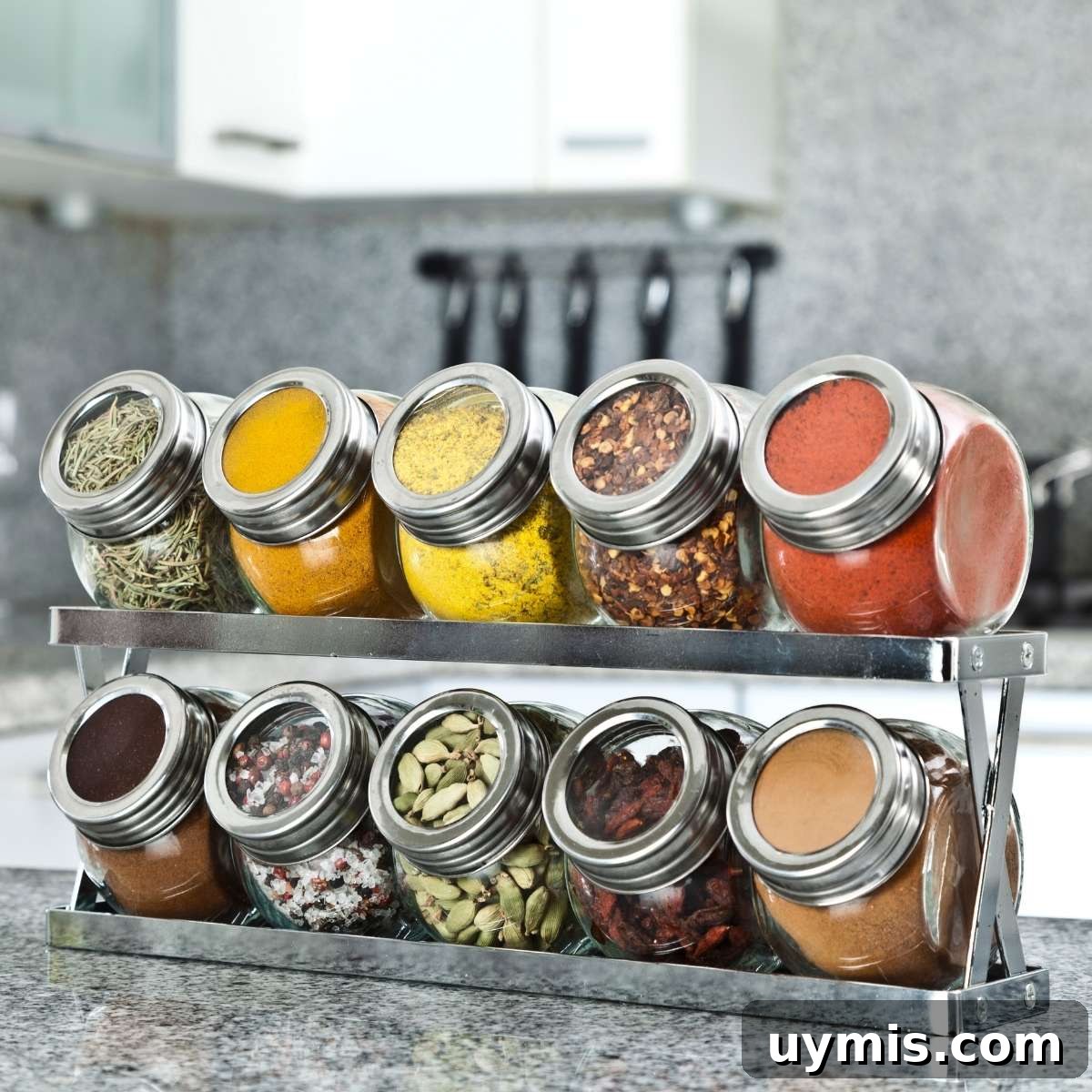 How to Organize a Spice Cabinet and Clear Clutter 2 Spices organized on a spice rack that goes in the cabinet or on a counter.