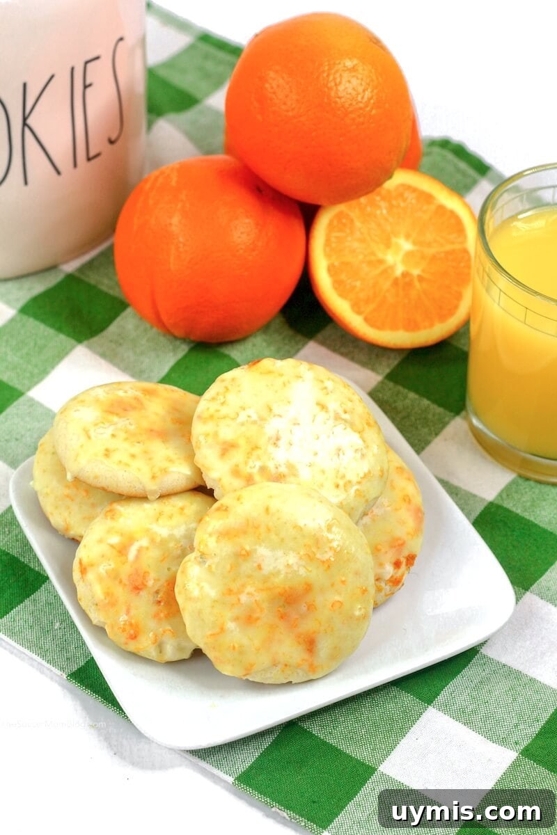 Zesty Orange Juice Cookie Recipe with Citrus Glaze 3 orange cookies with oranges and orange juice