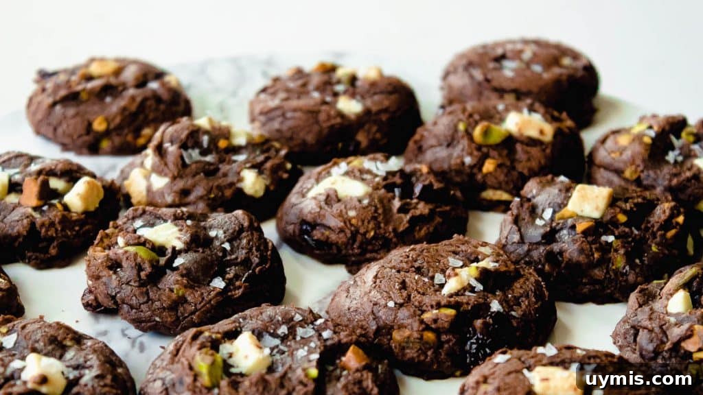 White Chocolate Cherry Pistachio Brownie Mix Cookies 5 Brownie Mix cookies on a tray