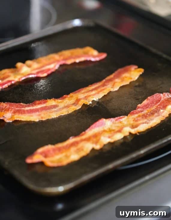 Maple Bacon Pancake Dippers Recipe 4 Pancake Bacon Dippers! A soft pancake surrounds a crispy piece of bacon that you can dip right in maple syrup!
