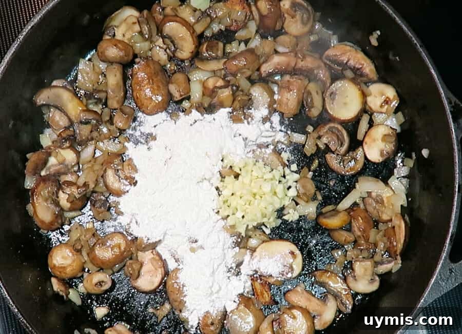 Creamy Ground Beef Stroganoff with Greek Yogurt 8 Garlic and flour stirred into mushrooms and onions