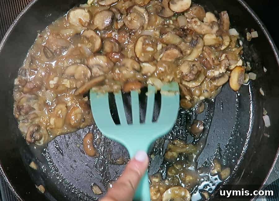Creamy Ground Beef Stroganoff with Greek Yogurt 10 Deglazing the skillet for ground beef stroganoff