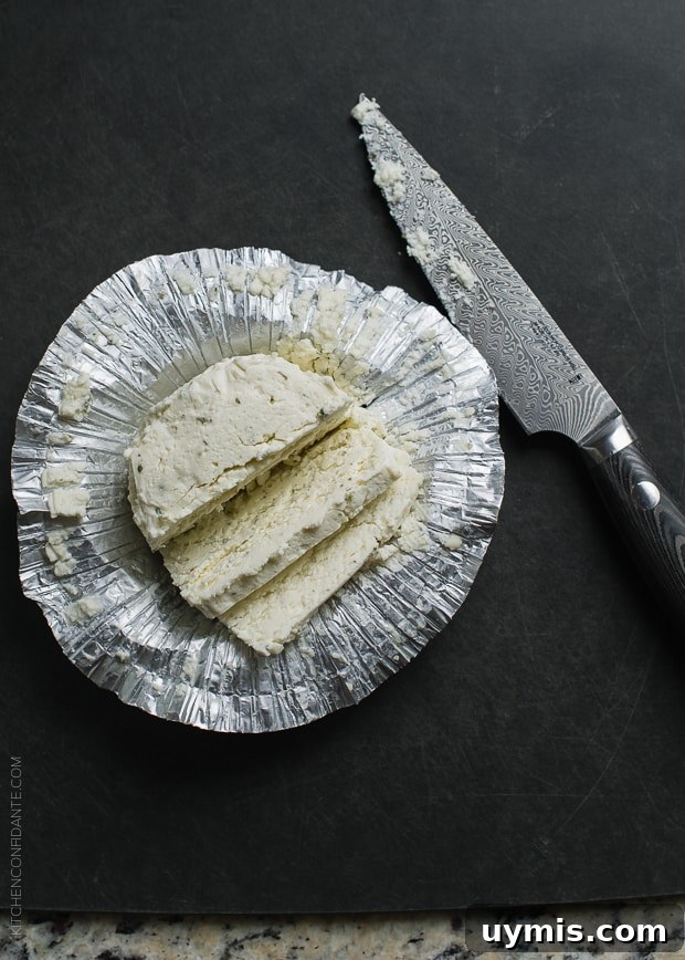 Boursin Garlic and Herb Buttermilk Biscuits Recipe 3 Boursin cheese sliced, in a foil wrapper.