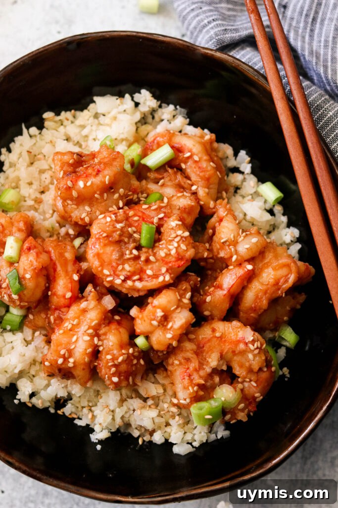 Asian Chili Garlic Shrimp - Paleo Whole30 Recipe 2 Asian Chili Garlic Shrimp in a bowl over cauliflower rice