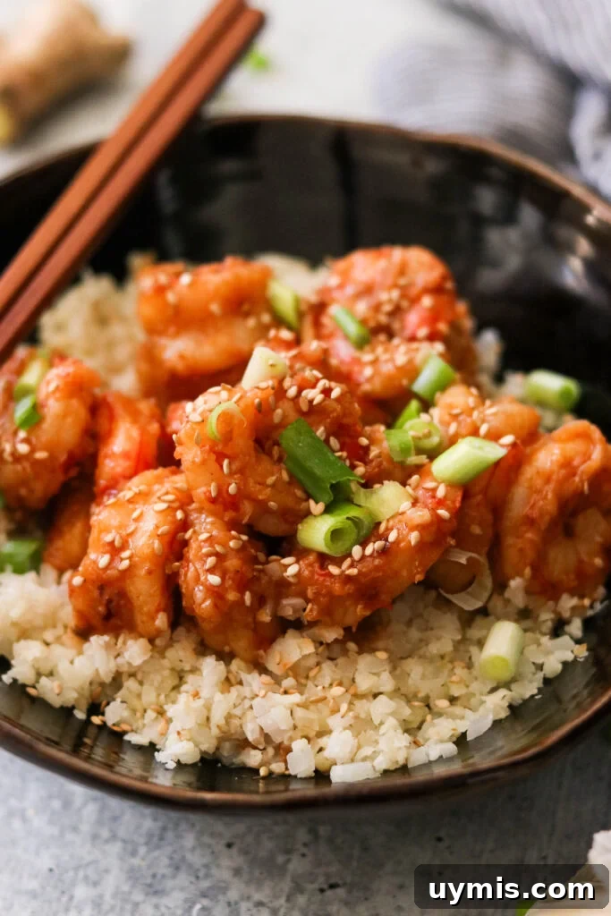 Asian Chili Garlic Shrimp - Paleo Whole30 Recipe 4 Whole30 chili garlic shrimp topped with sesame seeds and green onions