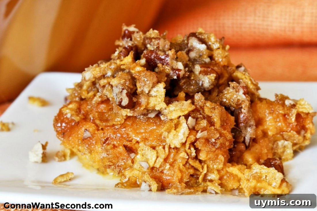 Sweet Potato Casserole plated with crunchy topping sweet potato casserole on a plate