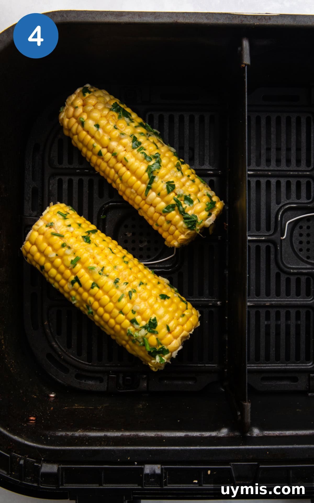 Air Fryer Corn on the Cob Recipe — Juicy and Crispy 7 corn in the air fryer.