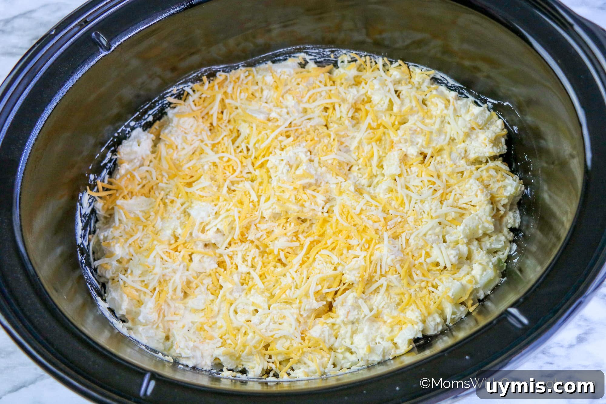 Creamy Slow Cooker Cheesy Hashbrown Casserole 5 Crockpot Cheesy Hashbrown Casserole ingredients in crockpot