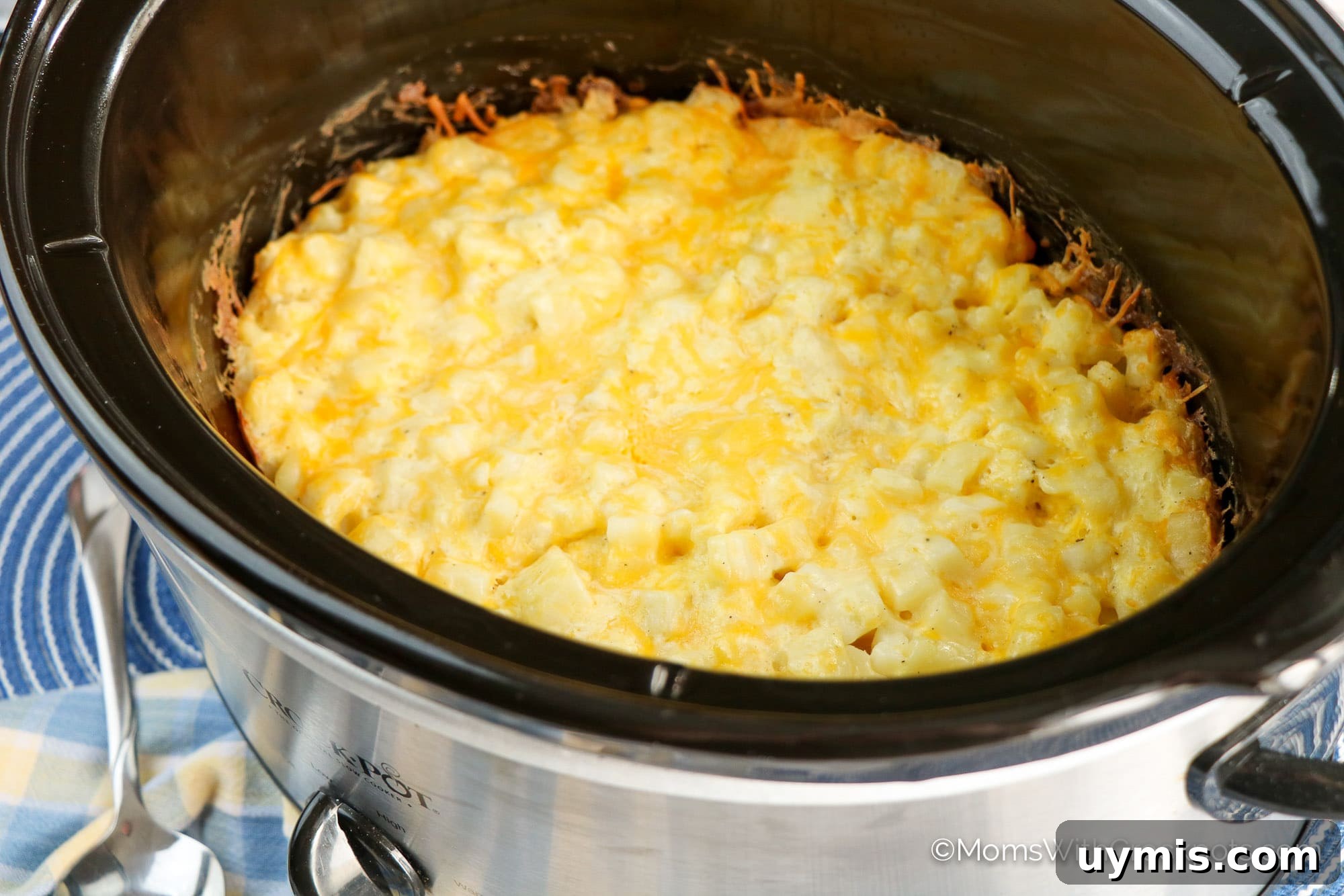 Creamy Slow Cooker Cheesy Hashbrown Casserole 6 Crockpot Cheesy Hashbrown Casserole in slow cooker