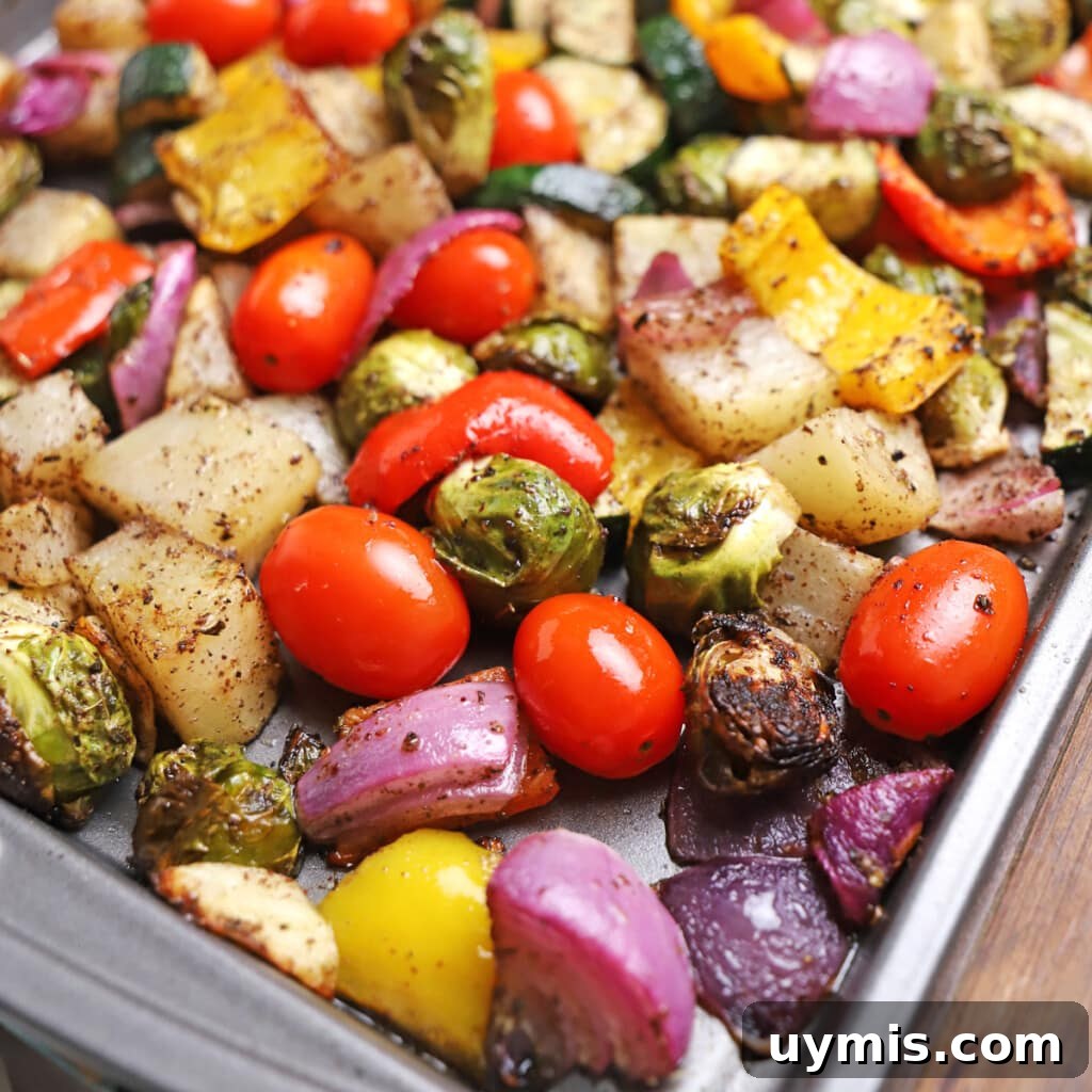 53-Recipe Meal Plan: Weekly Menus and Shopping List 10 roasted vegetables on a baking sheet.