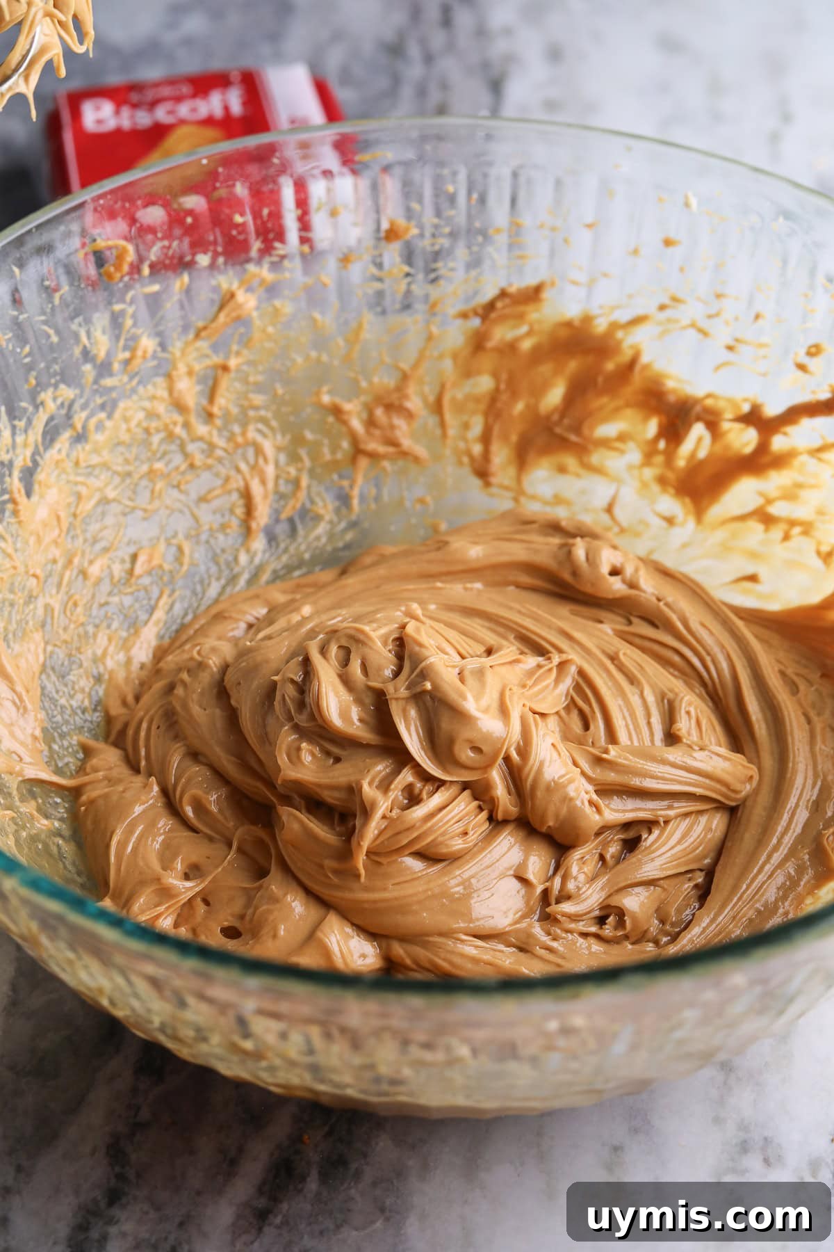 Creamy No-Bake Cookie Butter Pie Recipe 6 Cookie butter and cream cheese filling for the pie in a clear glass bowl.