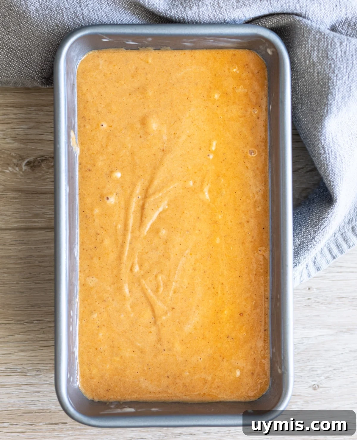 Bread batter in a 9x5 loaf pan.