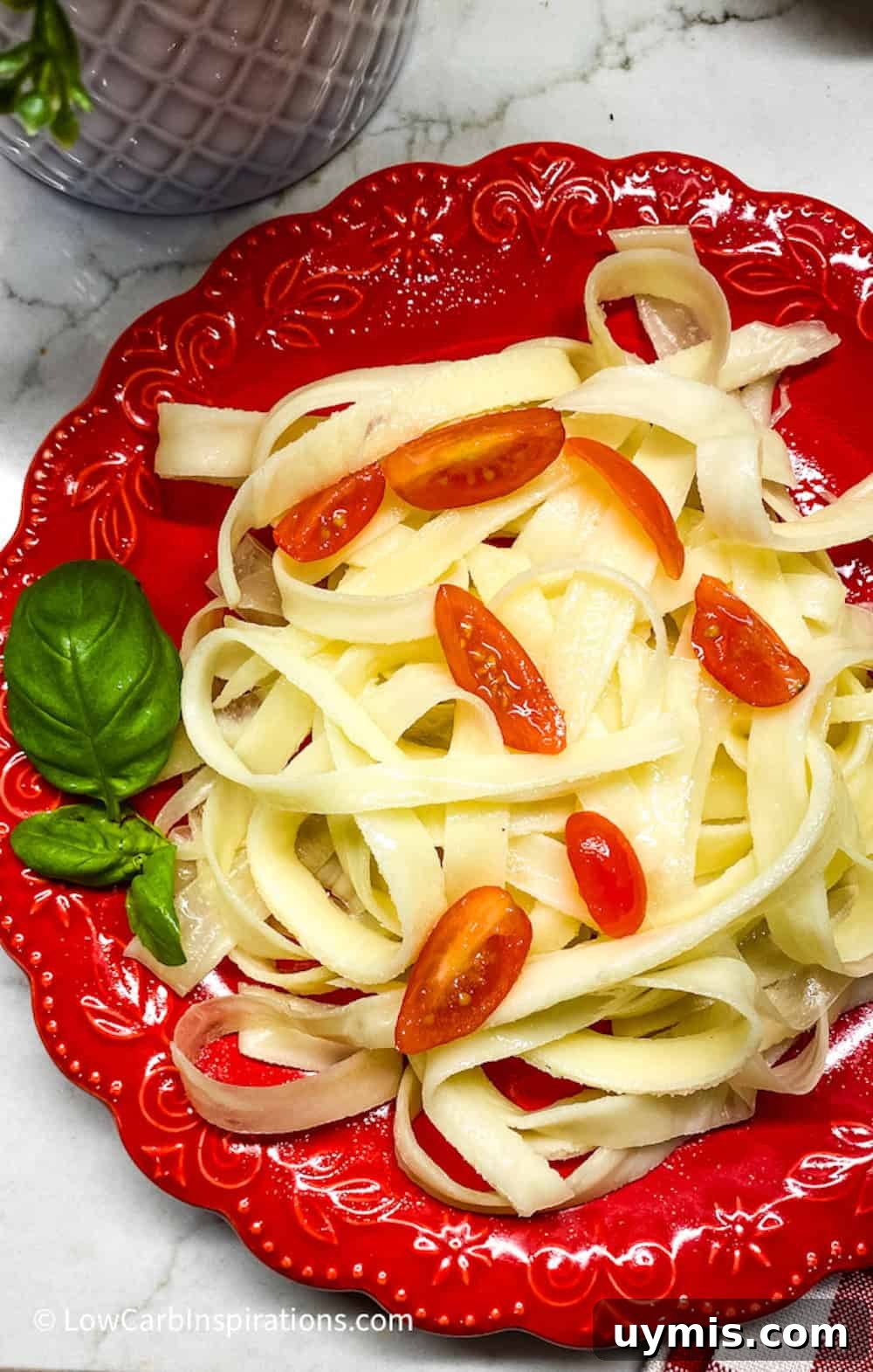 2 Ingredient Keto Pasta Recipe for Low Carb Noodles 2 Buttered pasta noodles with cherry tomatoes and basil