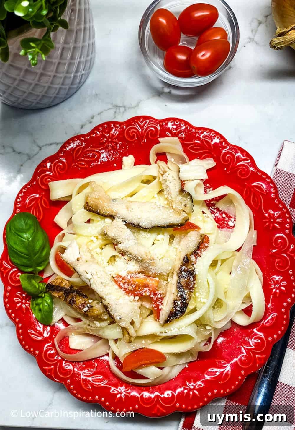 2 Ingredient Keto Pasta Recipe for Low Carb Noodles 6 Keto pasta noodles served on a red plate