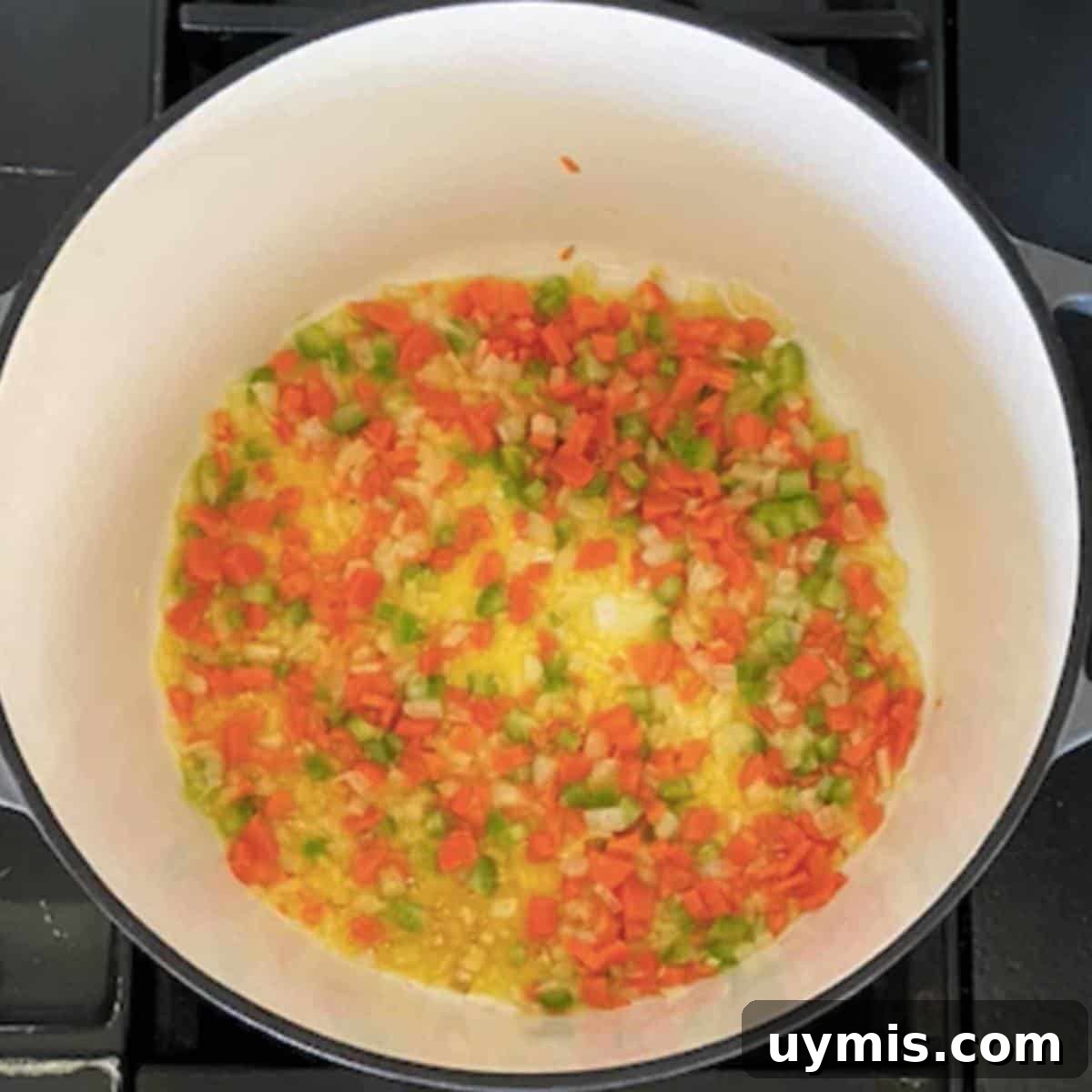 Vegetables cooking in dutch oven.