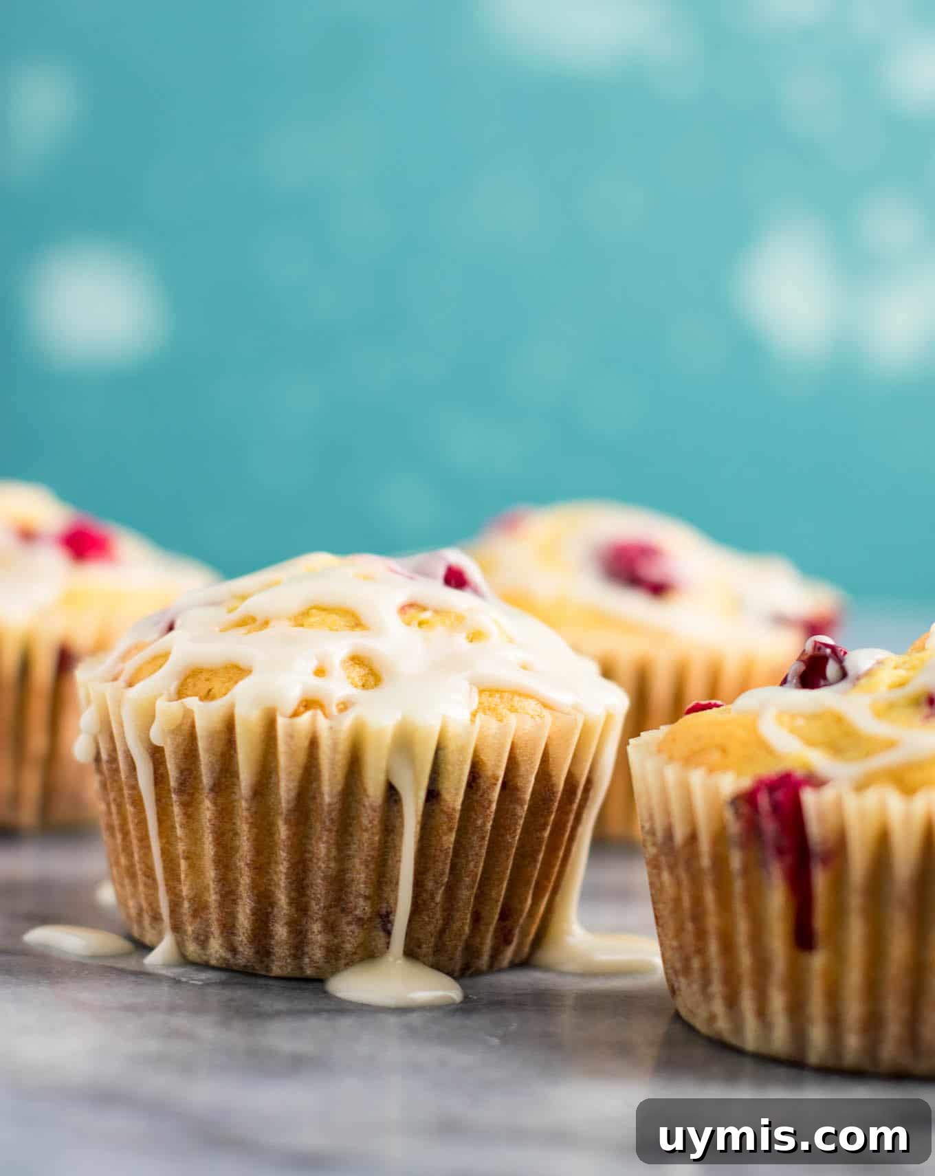 Cranberry Cream Cheese Muffins Recipe 5 Glazed cranberry cream cheese muffins cooling after baking