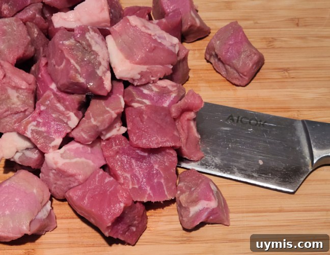 Cubed Petite Sirloin on a cutting board 