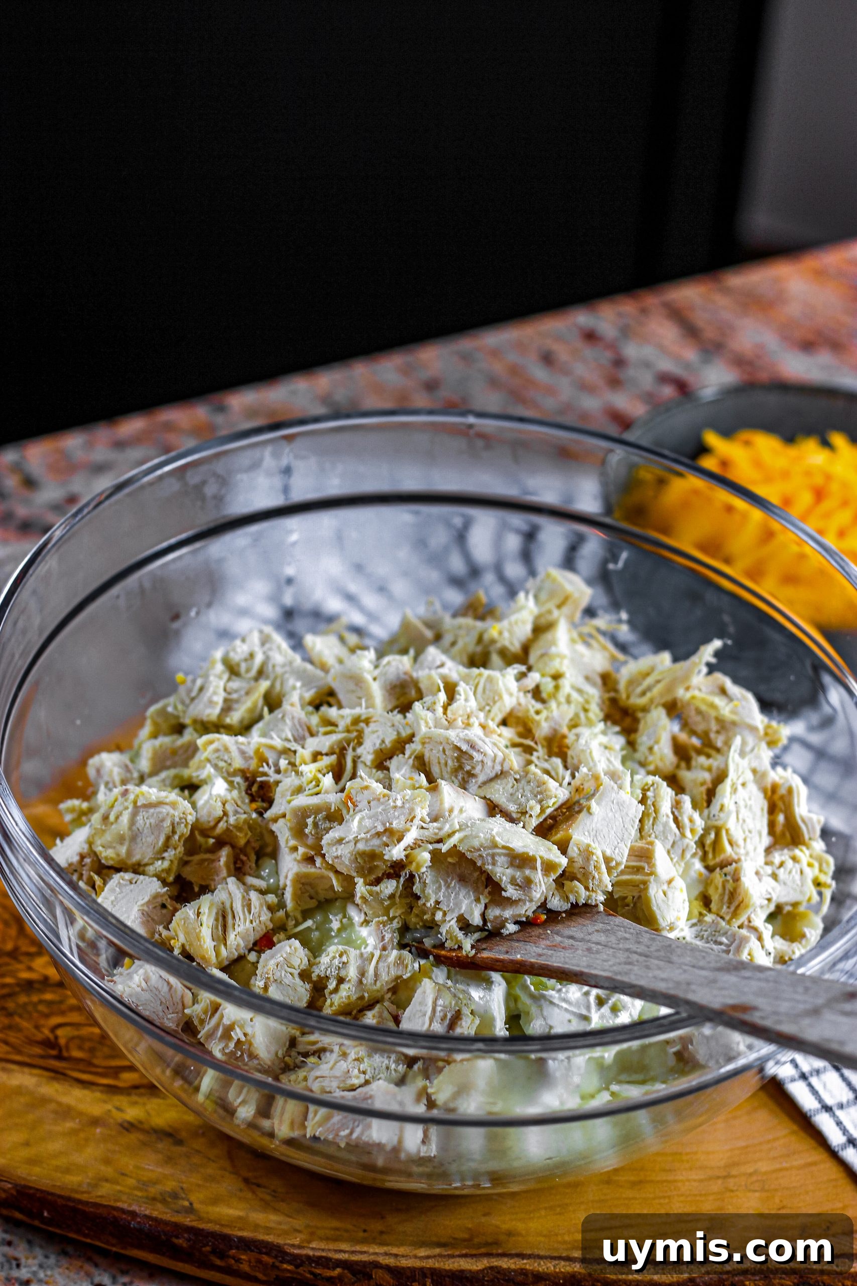 Creamy Chicken and Rice Casserole Recipe 10 Mixing chicken with creamy rice