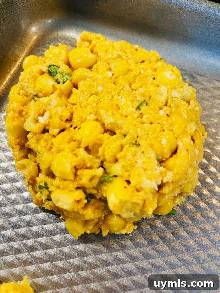 Blackstone Street Corn Fritters Recipe 9 up close fritter before cooking
