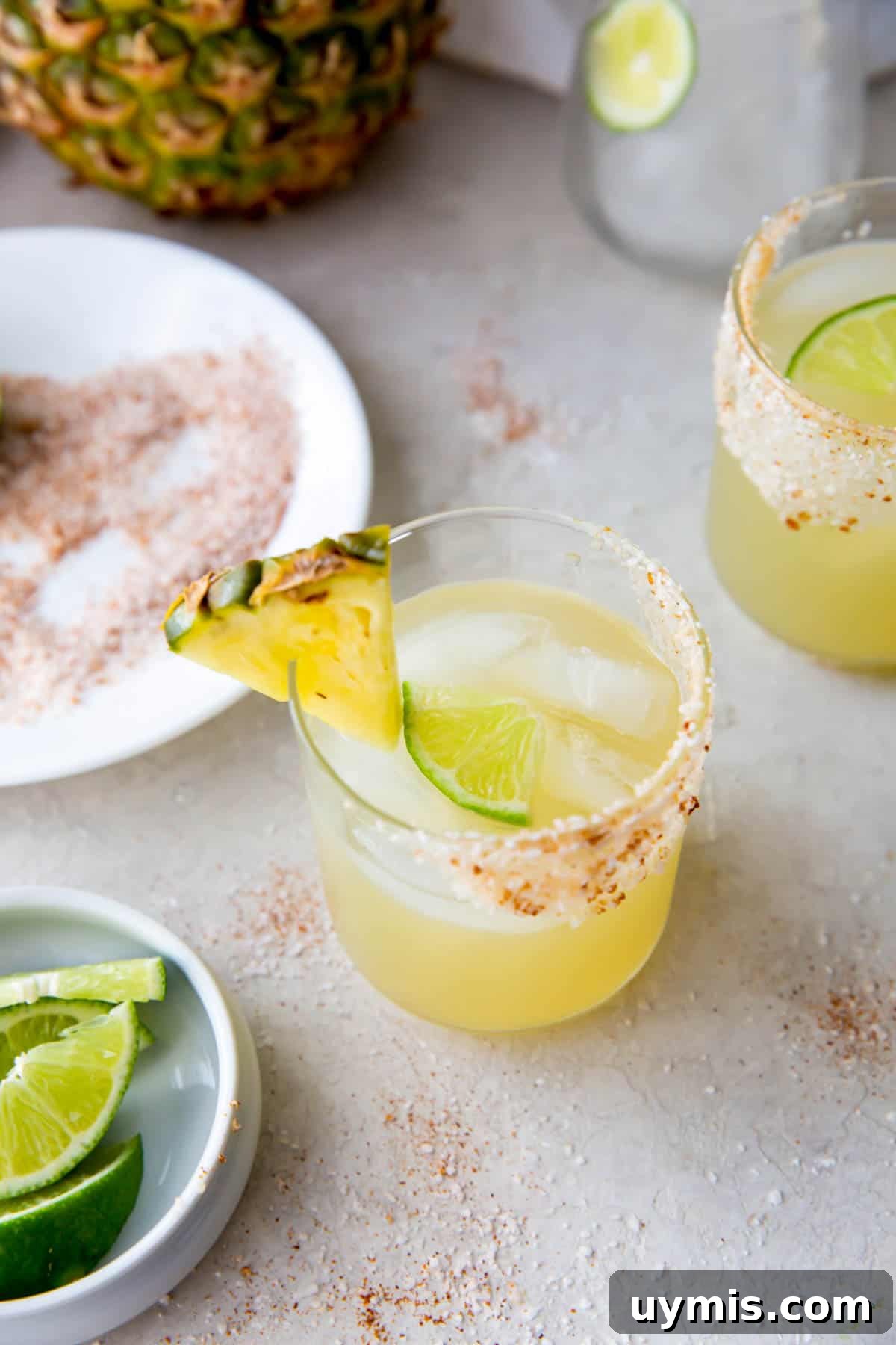 Smoky Mezcal Margarita Recipe 5 a glass with mezcalita and ice on a tabletop