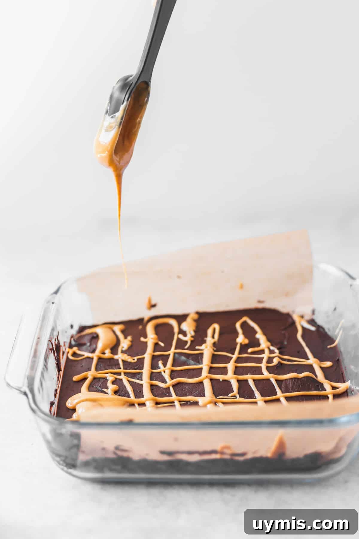 Peanut Butter Chocolate Cream Cheese Fudge Recipe 4 Cream cheese fudge in an 8x8-inch dish