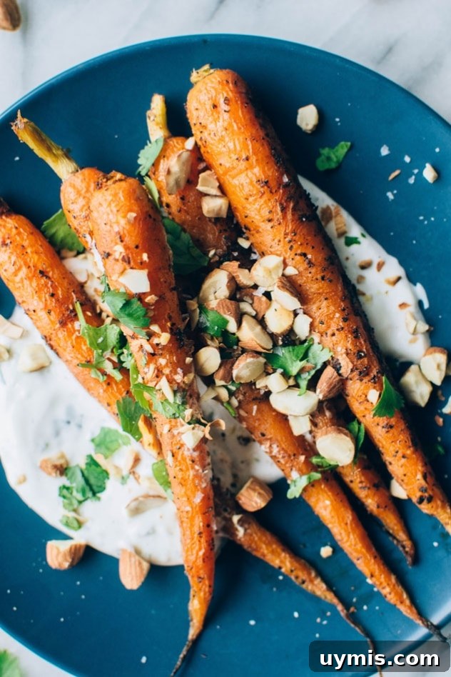 Black Pepper Roasted Carrots with Cilantro Yogurt and Almonds 6 Tender roasted carrots finished with cilantro and almonds.