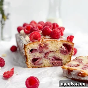 White Chocolate Raspberry Loaf Cake 17 raspberry white chocolate loaf cake cut so you can see inside.