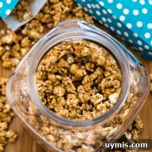 Crunchy Homemade Caramel Corn Recipe from Scratch 9 Overhead image of a glass candy jar filled with homemade caramel corn.