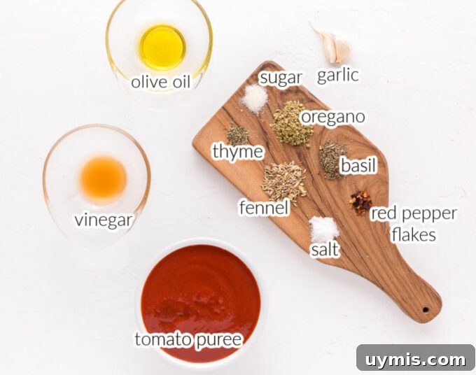 Homemade Pizza Sauce Recipe Without Tomato Paste 3 Garlic, spices, and tomato puree on a table.