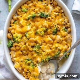 Creamy Broccoli Chicken Pasta Casserole 7 top view of broccoli chicken casserole with spoon in it.