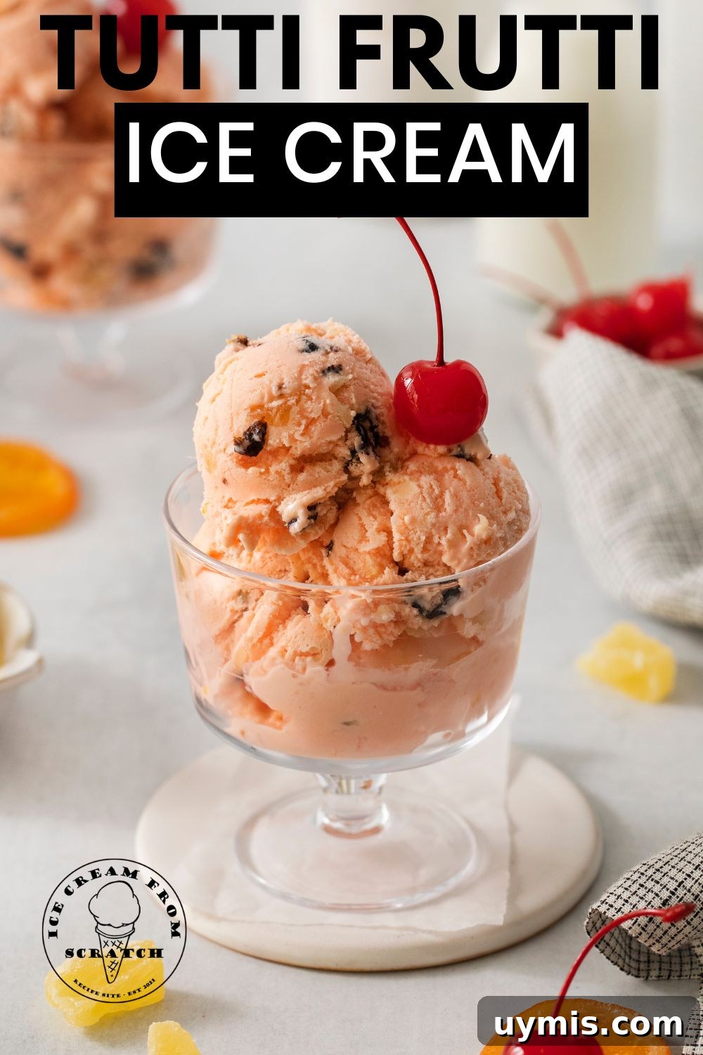 Homemade Tutti Frutti Ice Cream Recipe 5 a dessert dish filled with scoops of tutti frutti ice cream with a cherry on top. Text overlay says Tutti Fruitti Ice Cream in black lettering at the top.