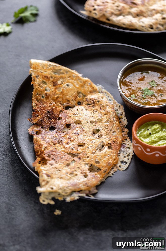 Rava dosa served with sambar and chutney
