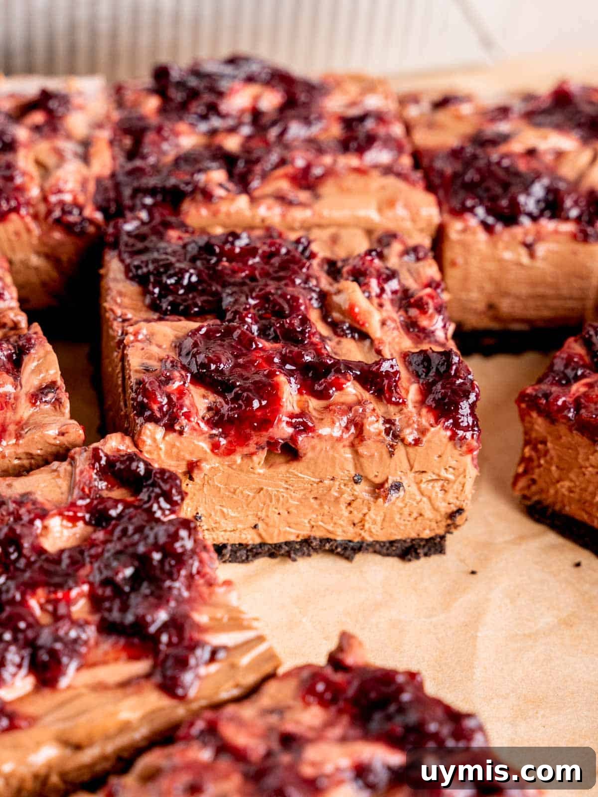 Creamy No-Bake Chocolate Cherry Cheesecake Recipe 14 Slices of chocolate cheesecake with cherry topping and an Oreo crust.