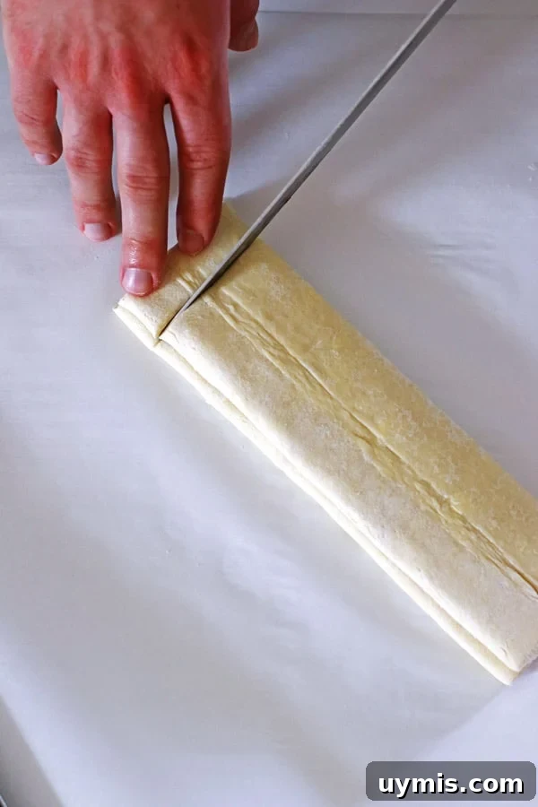Flaky Heart-Shaped Puff Pastry Recipe 4 Slicing the puff pastry into one inch slices with a sharp knife