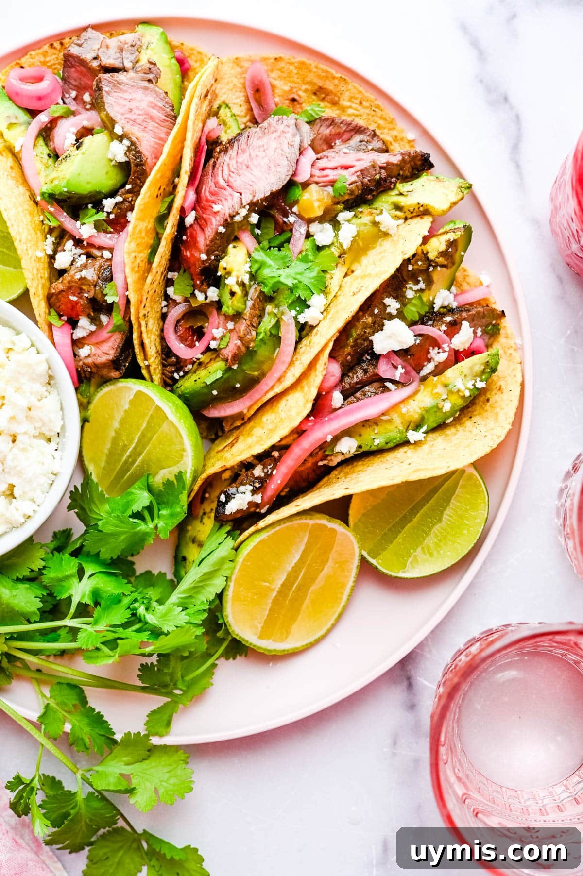 Carne Asada Tacos with Juicy Grilled Steak 11 Carne asada tacos with toppings.