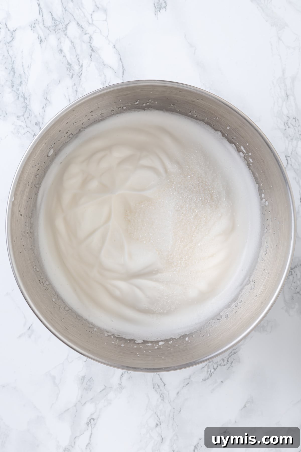 Aquafaba is a miracle worker in vegan baking. But what is aquafaba? And how do you use it? Here’s everything you need to know! Aquafaba in mixer bowl
