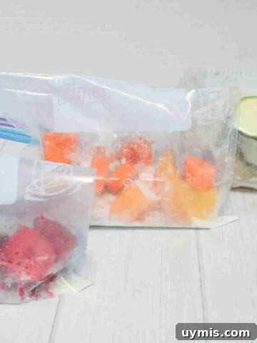 Three freezer smoothie packs lined up.
