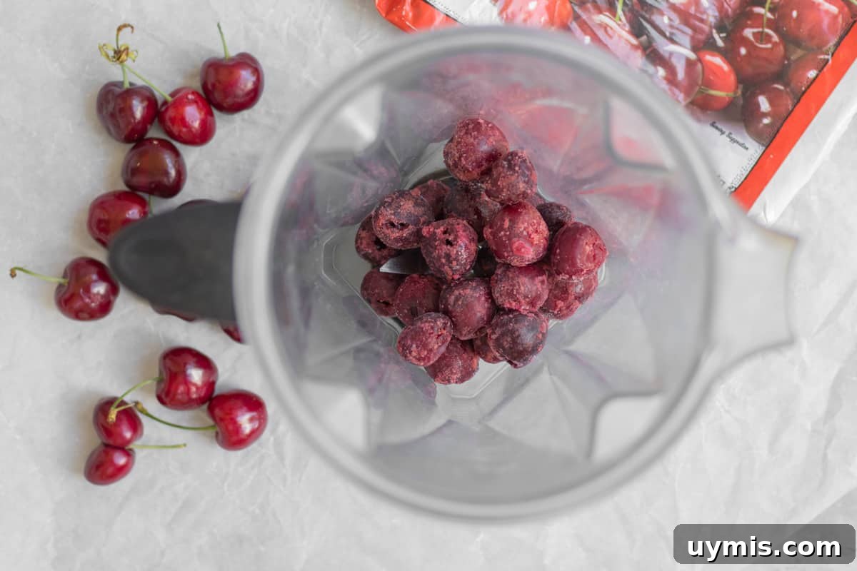 frozen cherries in a vitamix blender container