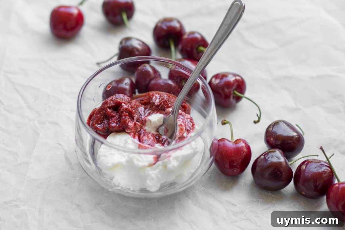 yogurt and cherry puree in a glass dish
